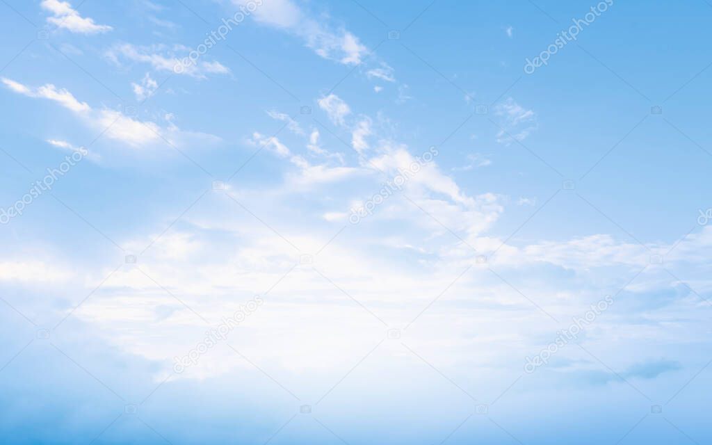 Beautiful Blue Sky with Clouds. Heavenly Dreamy Fluffy Fantasy Clouds Background.