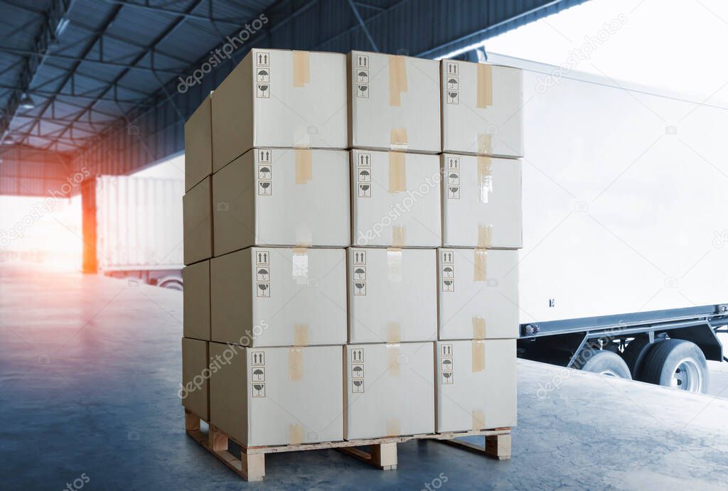 Packaging Boxes Loading into Shipping Container. Shipment Delivery. Warehouse Logistics. Cargo Freight Truck Transportation.