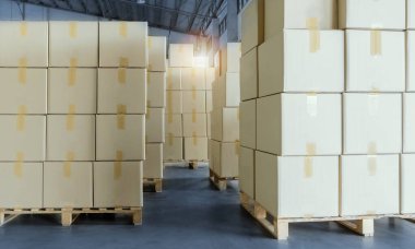 Packaging Boxes Stacked on Pallets in Storage Warehouse. Cardboard Boxes Supply Chain. Storehouse Commerce Shipment Distribution. Shipping Warehouse Logistics.