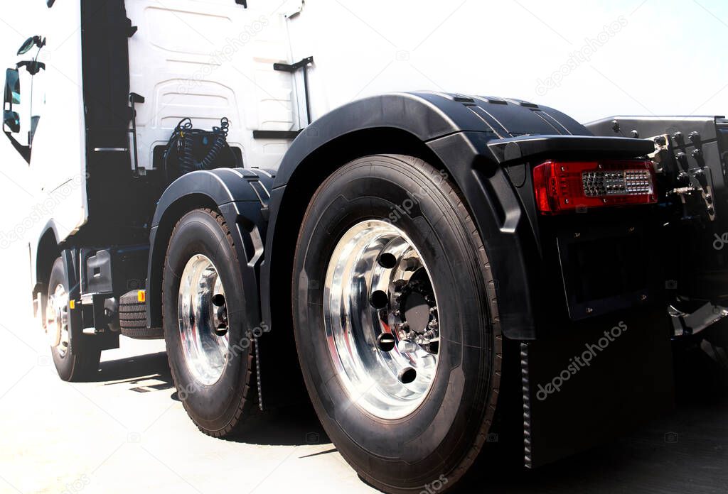 Rear of Semi Truck Wheels Tires. Rubber New Tyres. Chrome Wheels. Freight Trucks Transport