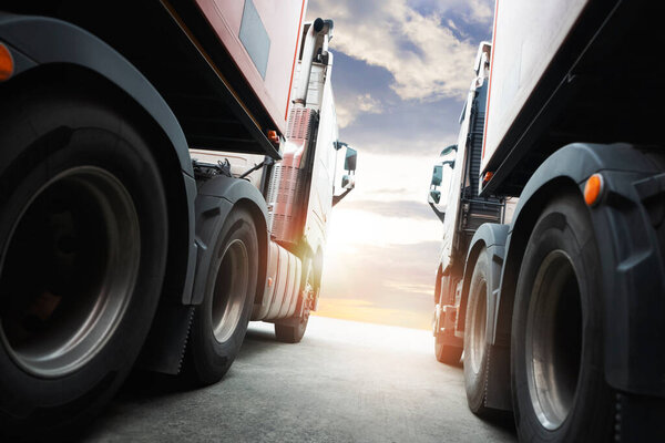 Semi TrailerTrucks Parked with Sunset Sky. Shipping Container Trucks. Truck Wheels Tires. Engine Diesel. Lorry Tractor. Industry Freight Trucks Logistics Cargo Transport.