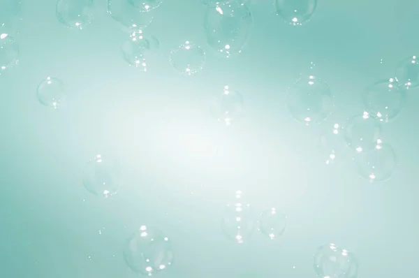 Beautiful Transparent Soap Bubbles with A White Space. Soap Sud Bubbles Water Background.