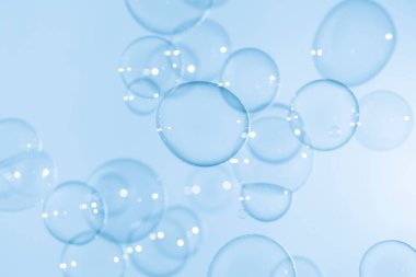 Transparent Blue Soap Bubbles Background. Soap Sud Bubbles Water.