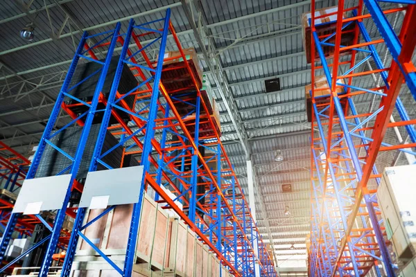 Interior of Storage Warehouse. Racks Pallets Shelves. Metal Construction. Row of Tall Shelf in Distribution Storehouse.