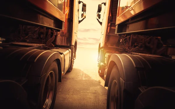 Semi Trailer Trucks Parked with The Sunset Sky. Shipping Container Trucks. Engine Diesel Trucks. Lorry Tractor. Industry Freight Trucks Logistics Cargo Transport.