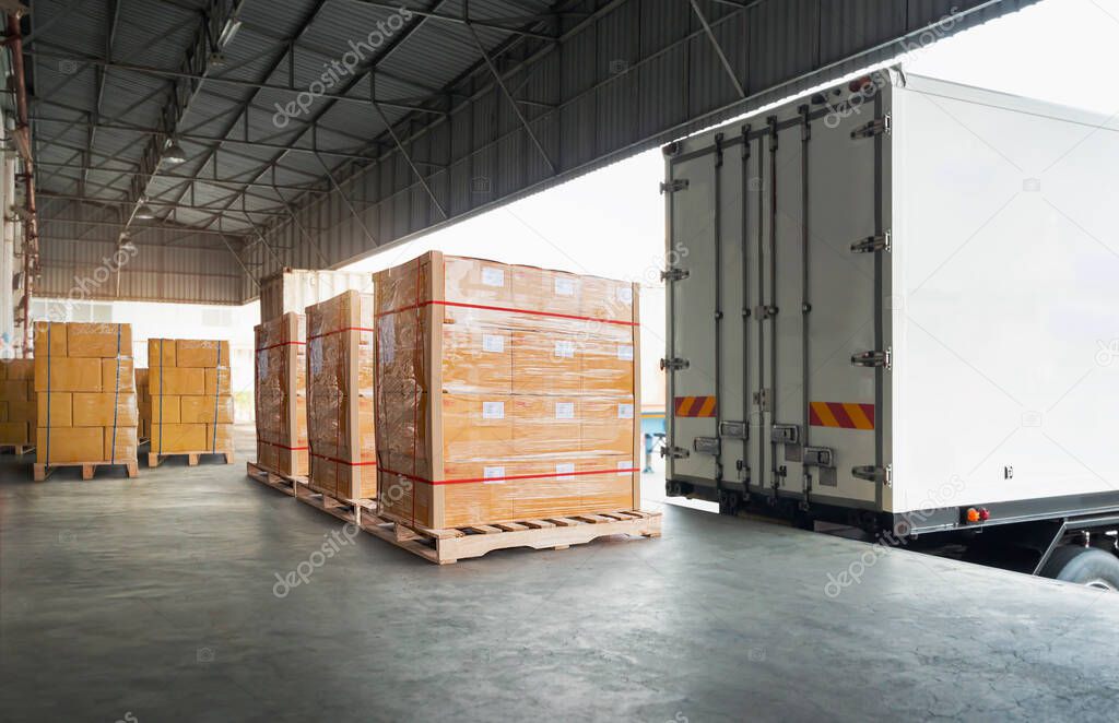 Packaging Boxes Wrapped Plastic Stacked on Pallets Loading into Cargo Container. Delivery Shipping Trucks. Supply Chain Shipment. Distribution Supplies Warehouse. Freight Truck Transport Logistics.