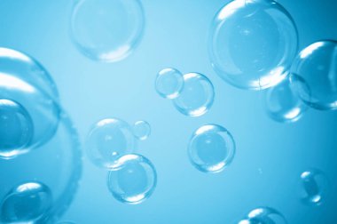 Soyut Güzel Şeffaf Mavi Sabun Köpükleri Arkaplanı. Sabun köpüklü su..