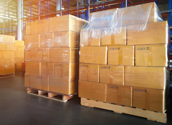 Packaging Boxes Stacked on Pallets in The Warehouse. Cartons, Cardboard Boxes. Supply Chain Goods. Storehouse Distribution. Cargo Shipping Supplies Warehouse Logistics.