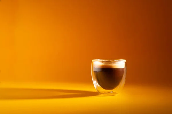 Freshly Brewed Creamy Espresso Glass Coffee Cup Isolated Yellow Background — Stock Photo, Image
