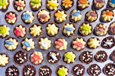 variety of Party Cupcakes a lot of colours top view
