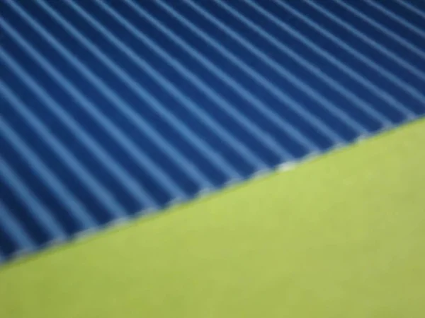 Niebiesko-zielony projekt graficzny powierzchni z wyraźnymi liniami i żebrowaną powierzchnią jako tłem — Zdjęcie stockowe