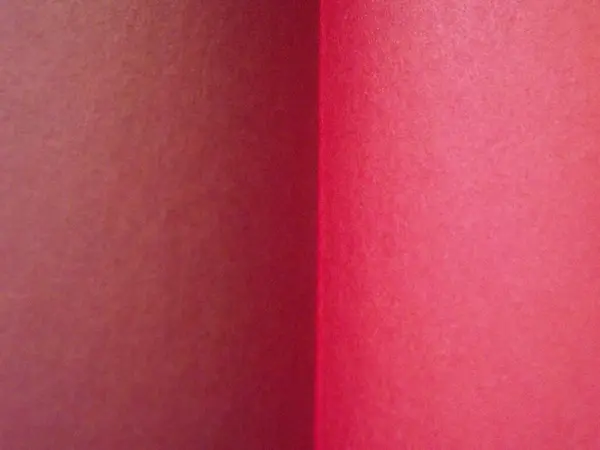 Burgunda, szkarłatna, czerwona, różowa powierzchnia papieru z wyraźnym oddzieleniem kolorów jako tła — Zdjęcie stockowe