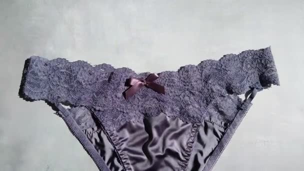 Dark Blue Erotic Panties Made Silk Guipure Close Gray Background — Stock Video