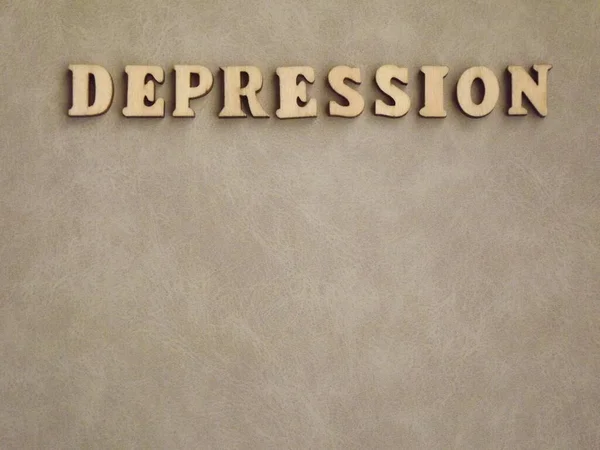 Depresi penyakit mental dalam huruf kayu pada latar belakang hitam — Stok Foto