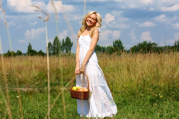 Girl in a white sundress — Stock Photo, Image