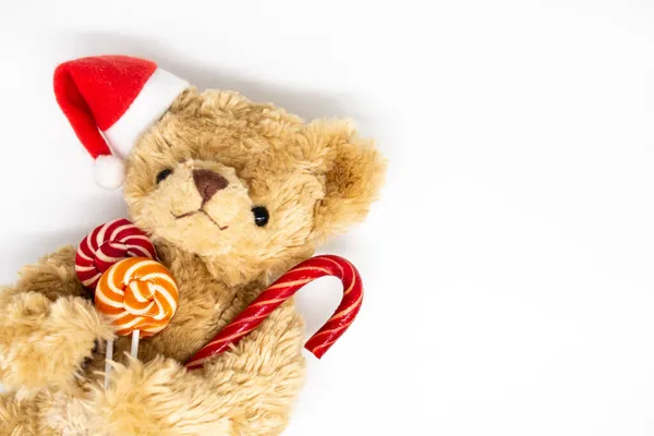 Ein Stofftier Teddybär Mit Roter Nikolausmütze Auf Einem Ohr Der — Stockfoto