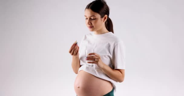 Beautiful Pregnant Woman Takes Her Pill Usual Drinks Glass Water — Wideo stockowe