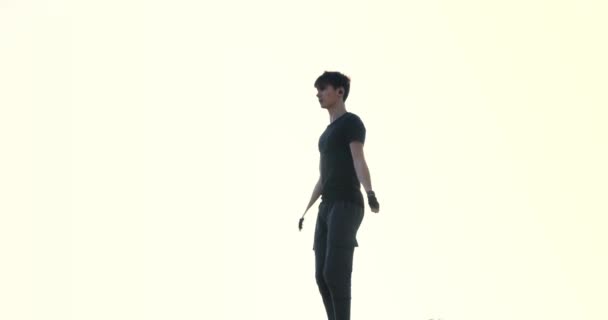 Sports Man Silhouette Doing Jumping Exercises Skipping Rope Pier Sunrise — Stockvideo