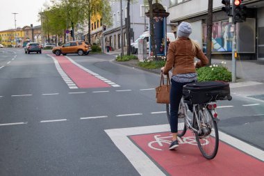 person riding a bicycle in the city
