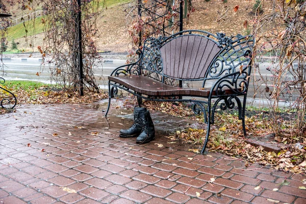 Old Black Torn Lace Shoes Stand Park Bench Cloudy Autumn — Stock Photo, Image