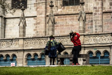 cityscape and local people from different angles of the mountainous capital of Ecuador, Quito 