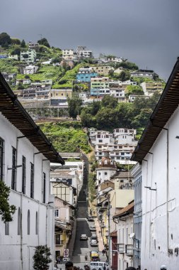 cityscape and local people from different angles of the mountainous capital of Ecuador, Quito 