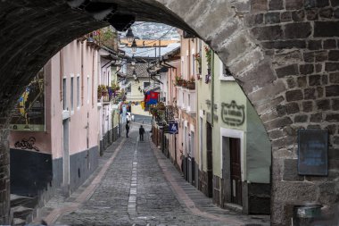 cityscape and local people from different angles of the mountainous capital of Ecuador, Quito 