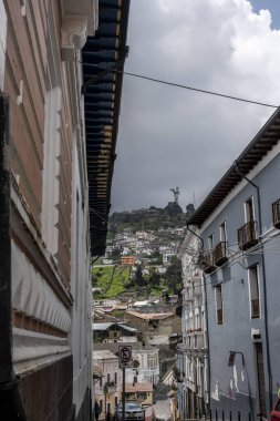 cityscape and local people from different angles of the mountainous capital of Ecuador, Quito 