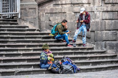 cityscape and local people from different angles of the mountainous capital of Ecuador, Quito 
