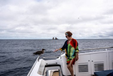 woman tourist on the Galapagos Islands on the background of nature 