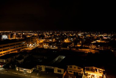 night landscape of seaside town promenade with beach