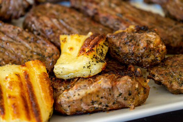 Grilled steaks meat and halloumi cheese