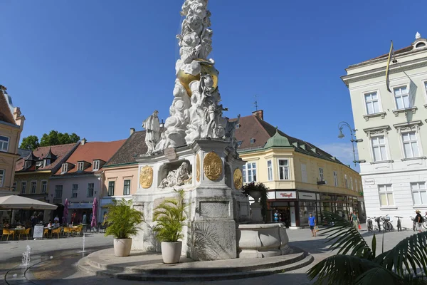 Plague column on the town square of the spa town of Baden near Vienna, Lower Austria, Austria