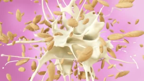 新鲜杏仁在鲜牛奶中慢动作喷射4K — 图库视频影像