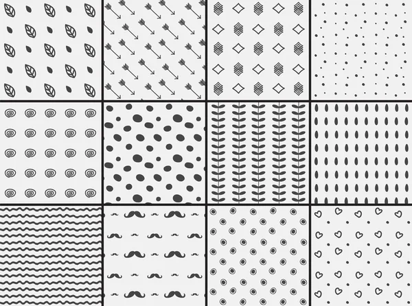 Uppsättning 12 svarta och vita sömlös doodle mönster — Stock vektor