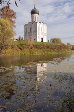 Church of the Intercession on the Nerl. General plan of the church from the side. Shot in the fall