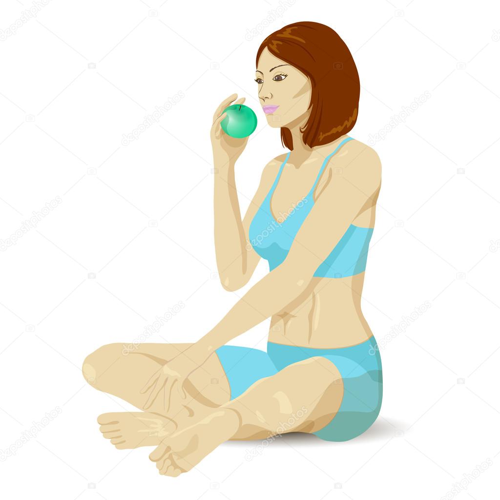 The sports girl eats fruit