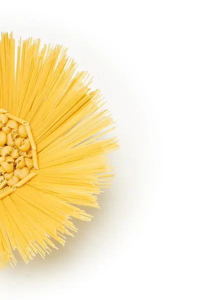 Pasta mix, in the shape of the Sun top view isolated on a white background — Stock Photo, Image