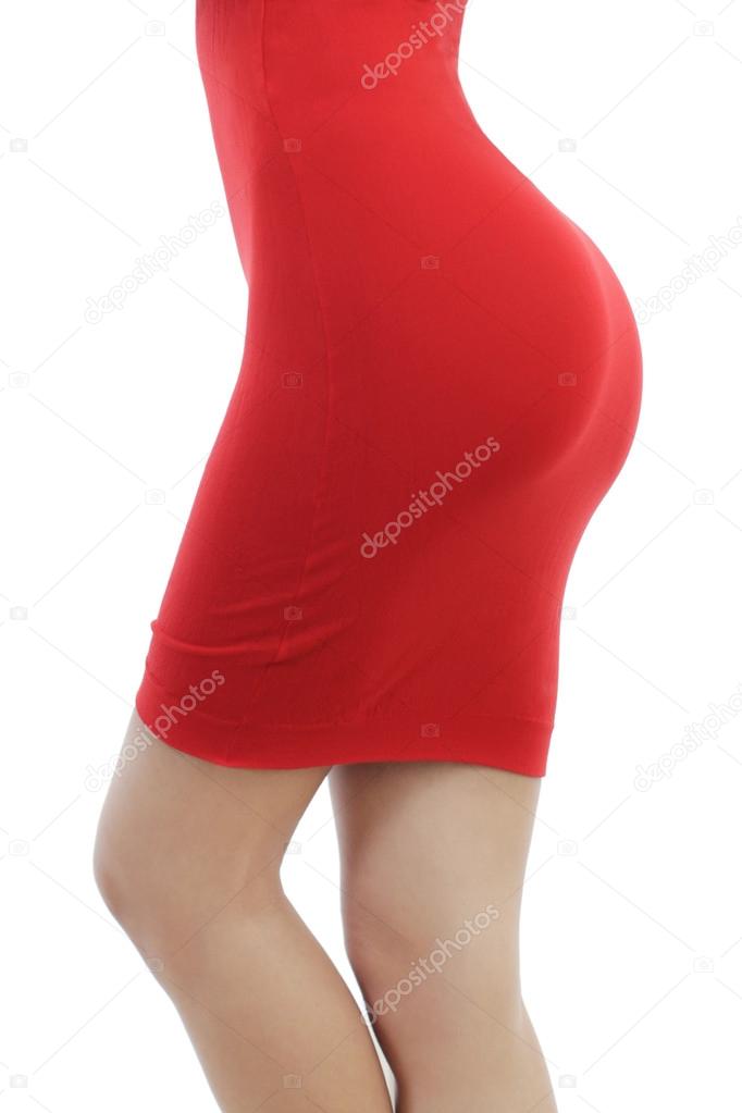 Beautiful young woman in a tight red dress isolated on a white background. Cropped body part