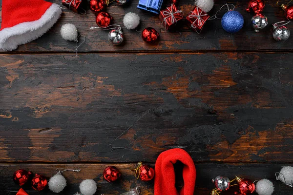 Vintage Christmas decorations set, frame, top view flat lay, on old dark  wooden table background, with copy space for text