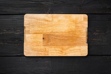 Boş vintage kesme tahtası seti, siyah ahşap masa arkaplanı, üst görünüm düz yatay, metin veya ürün için kopyalama alanı ile