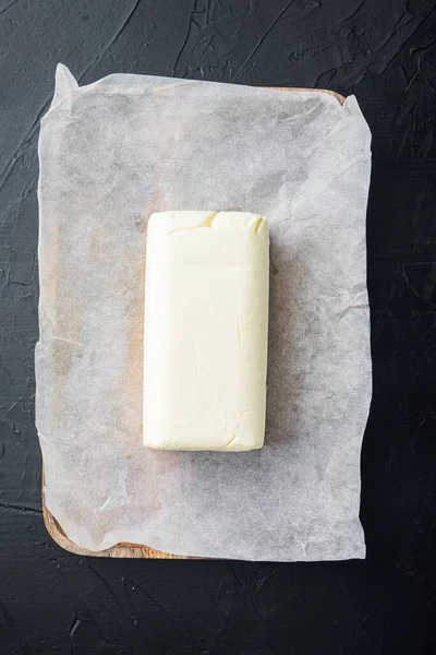 Manteiga Tijolo Espalhado Sobre Fundo Preto Vista Superior Flat Lay — Fotografia de Stock