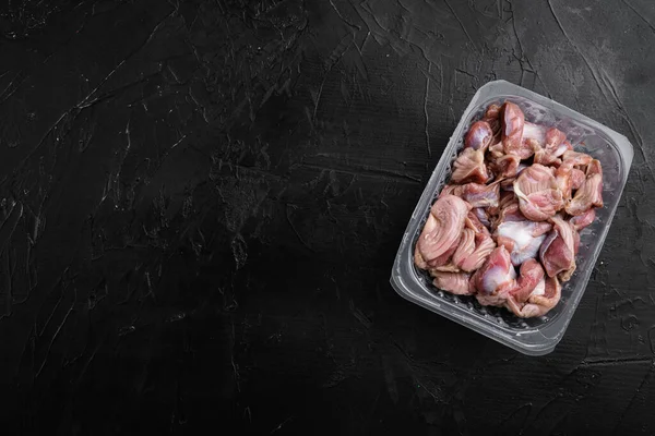 Raw Uncooked Chicken Gizzards Stomach Plastic Pack Set Black Dark — Zdjęcie stockowe