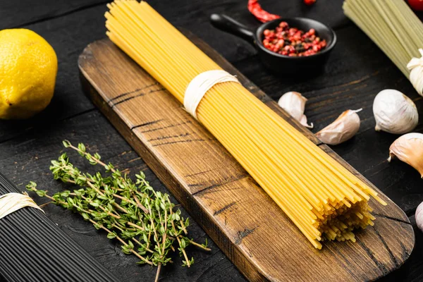 Dry Colorful Pasta Spaghetti Set Black Wooden Table Background — Stock Photo, Image