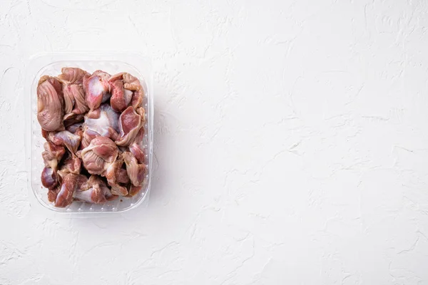 Chicken Stomach Container Set White Stone Table Background Top View — Zdjęcie stockowe