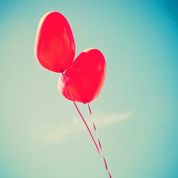 Retro love balloons on sky — Stock Photo, Image