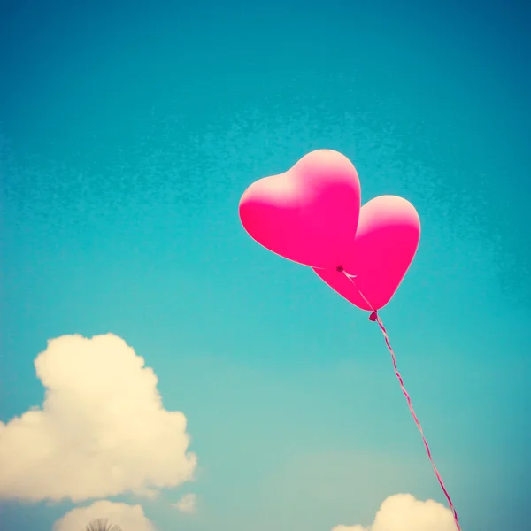 Heart balloons on vintage sky — Stock Photo, Image