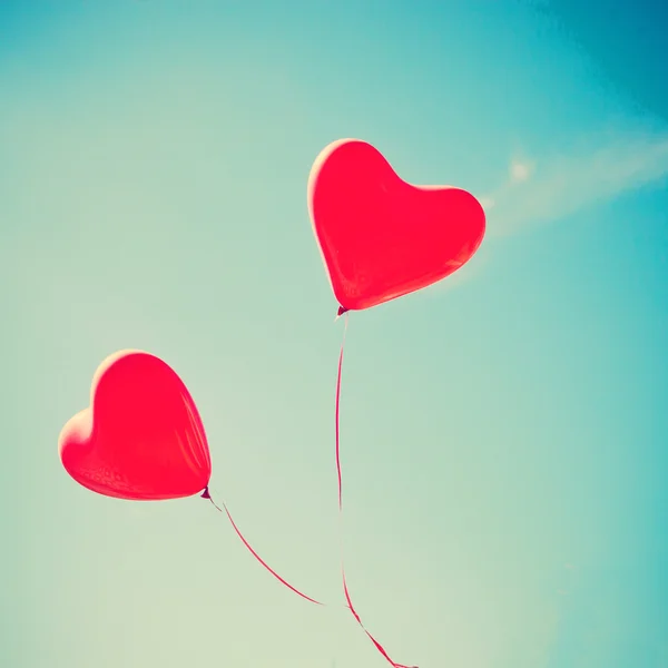 Retro love balloons on sky — Stock Photo, Image