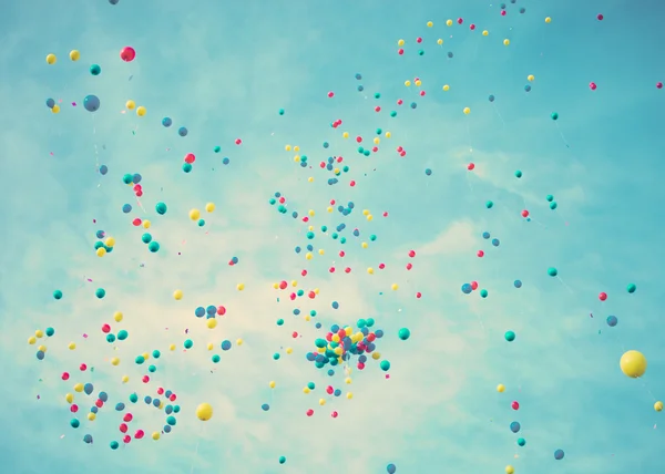 Colored balloons in flight — Stock Photo, Image