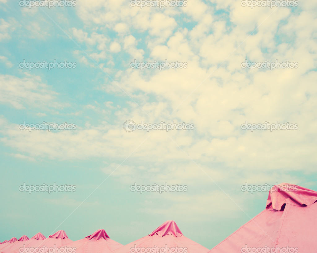 Pink beach umbrellas — Stock Photo © andrekaphoto 50551175